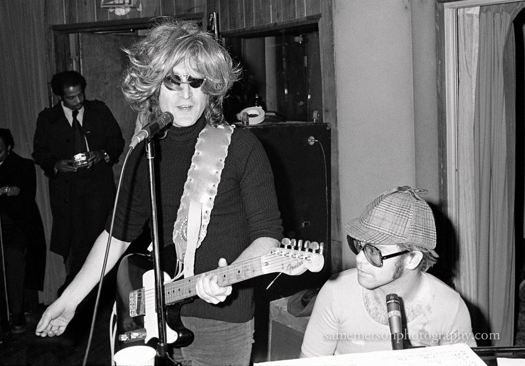 John Lennon (in wig) and Elton John